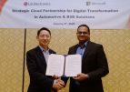 Dr. Lee Sang-yong von LG und Sanjay Ravi von Microsoft haben die Zusammenarbeit der beiden Unternehmen besiegelt. Abbildung: LG